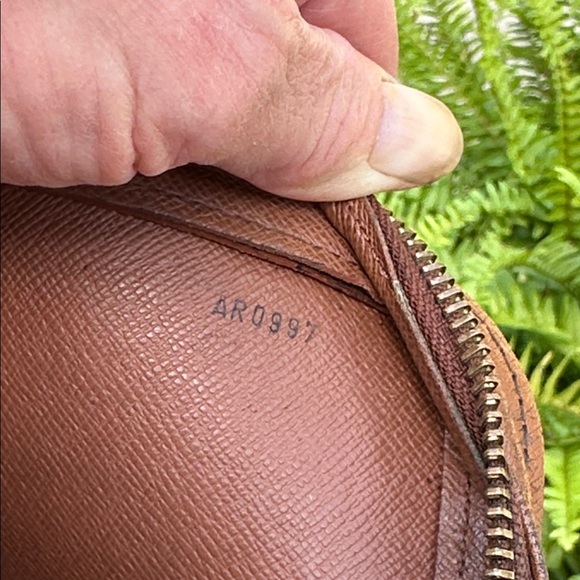 Louis Vuitton Monogram Pochette Orsay Clutch 
Date Code AR0997
9” x 7” x 2” - Picture 12 of 13